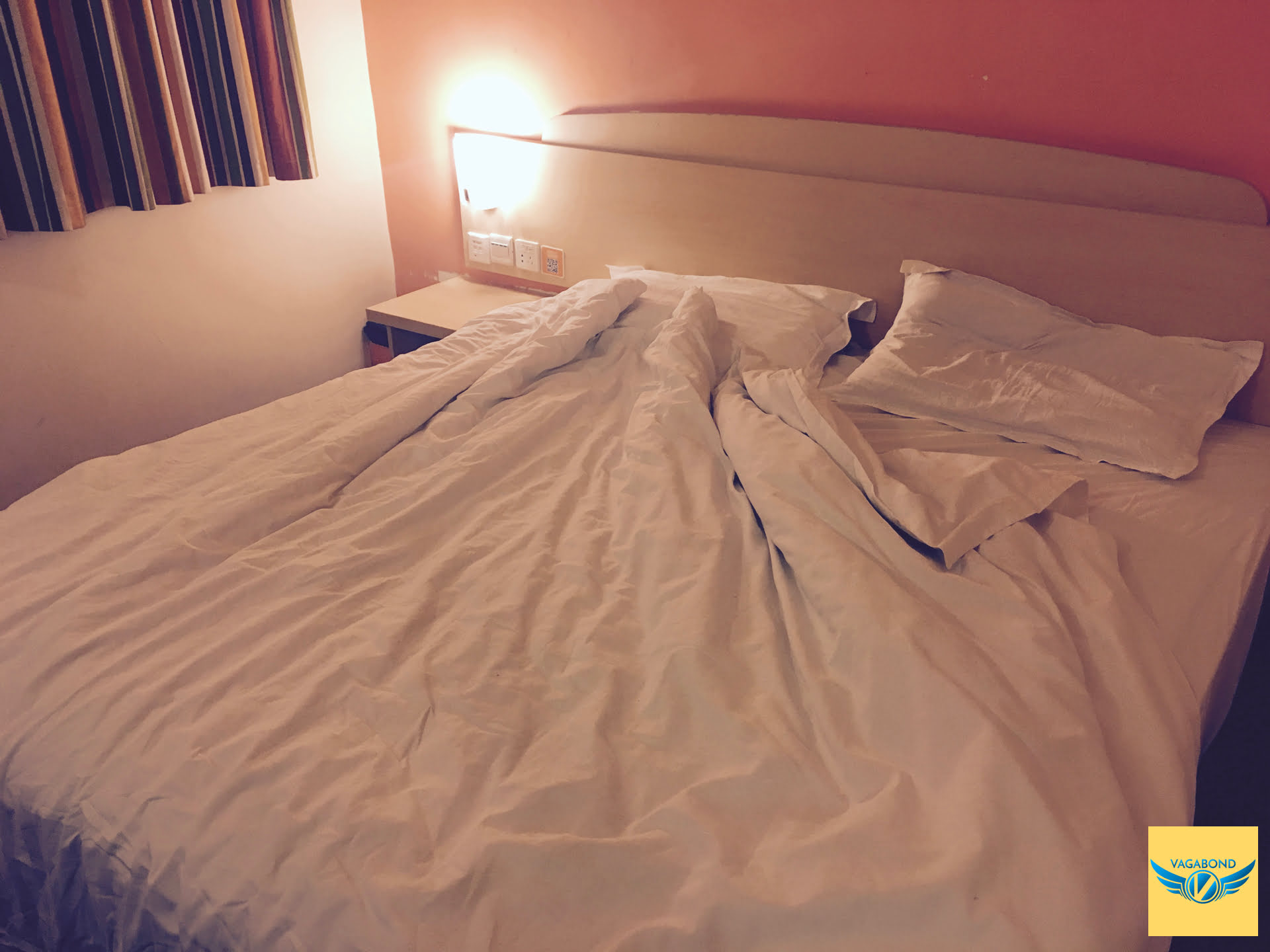 7天連鎖酒店(7 Days Inn)的床鋪。