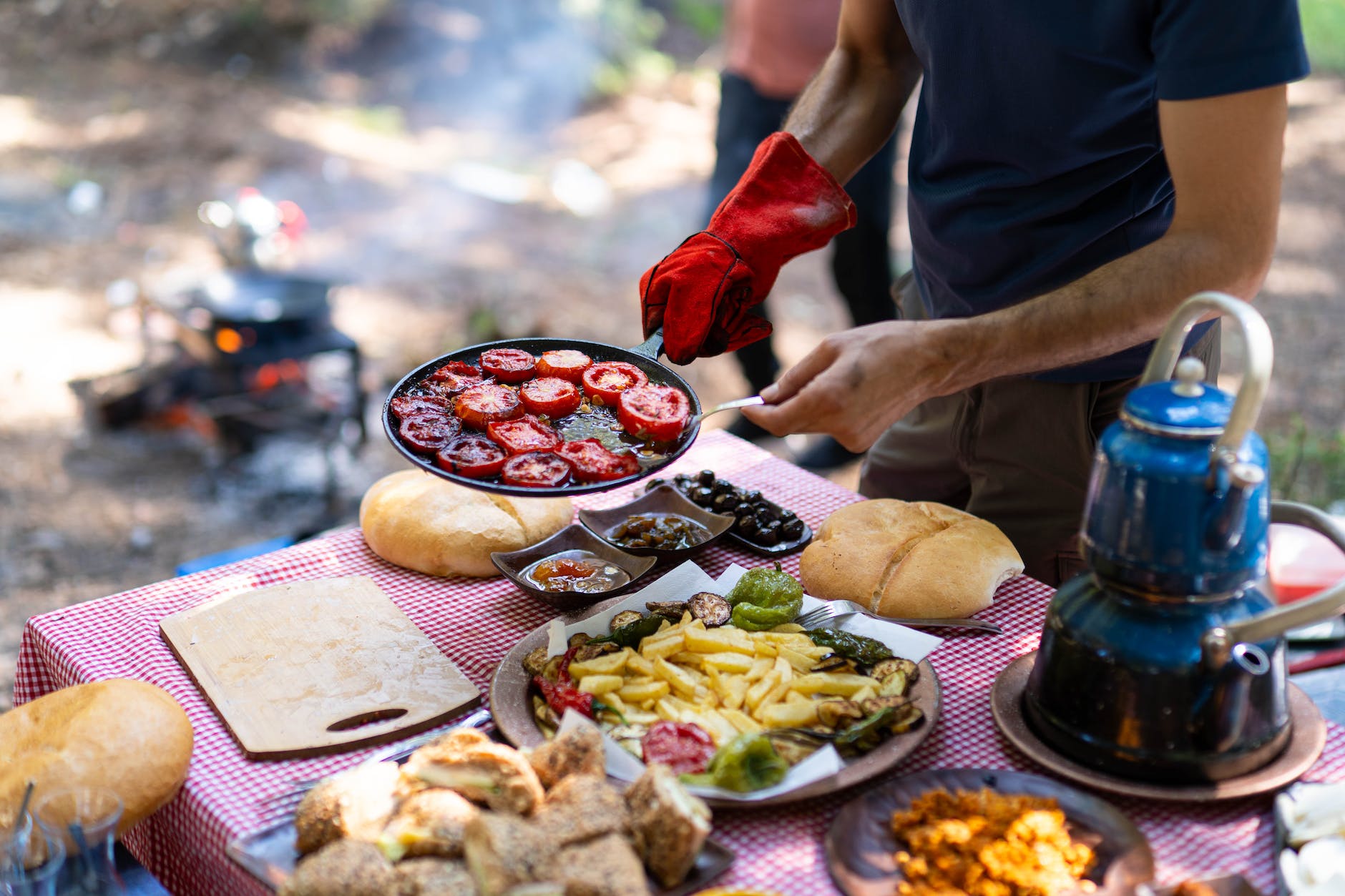 man preparing food on camping