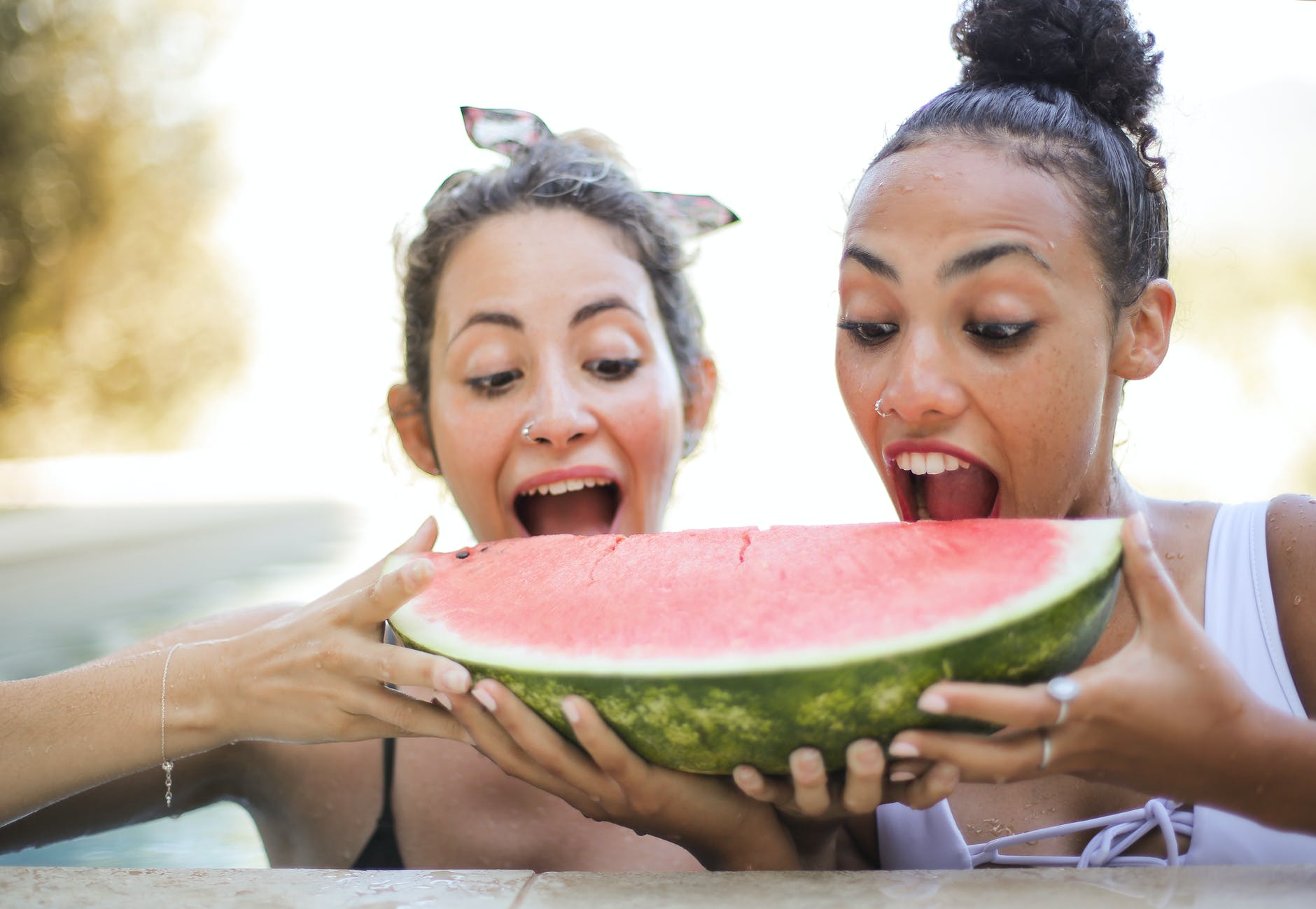 The best fruits to take with you on a mountain hike 2 Photo of women eating watermelon